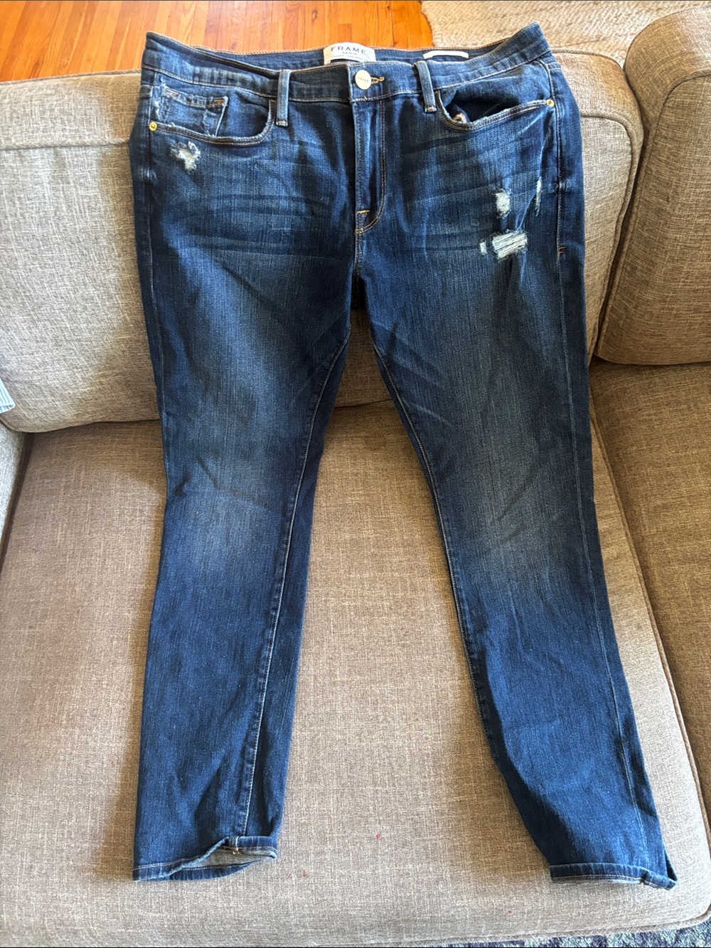 Frame Denim Skinny Jeans in Dark Indigo with Faded Highlights